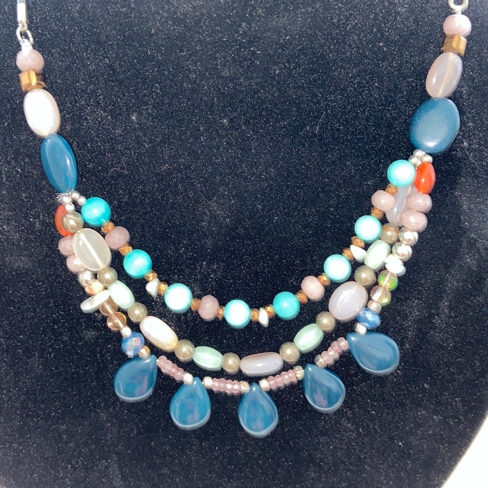 Beautiful beaded necklace new without tags three layers of beads many colors